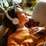 brunette young woman listening music